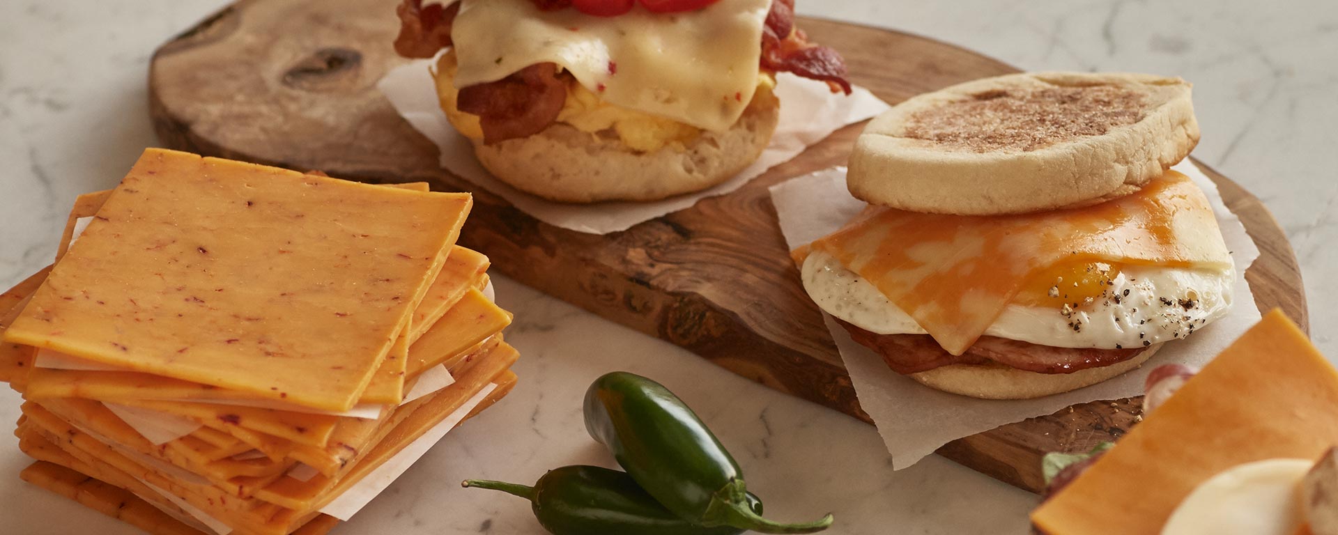 Stacked cheese and cheese on breakfast sandwiches